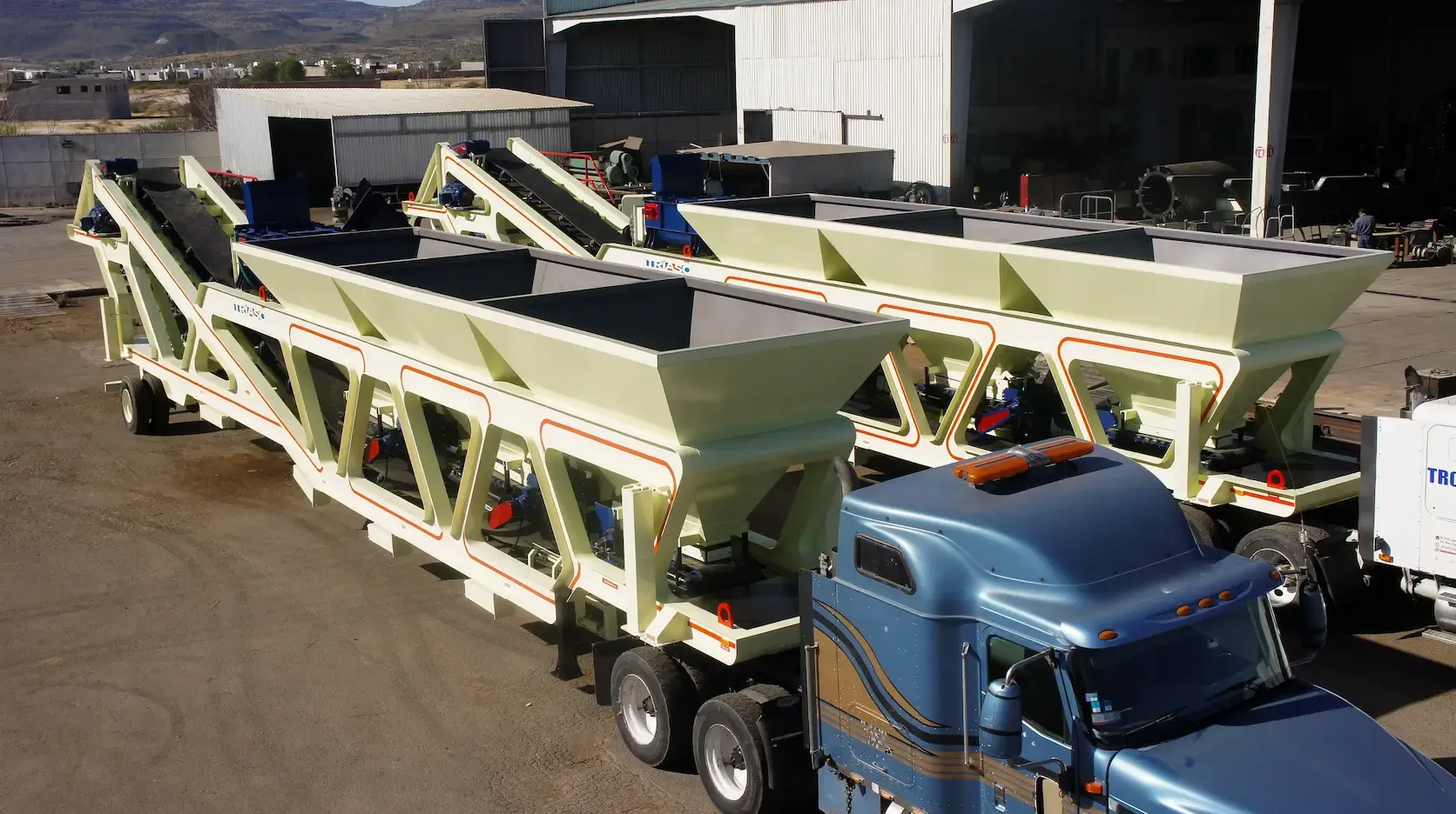 Bin units loaded onto trucks
